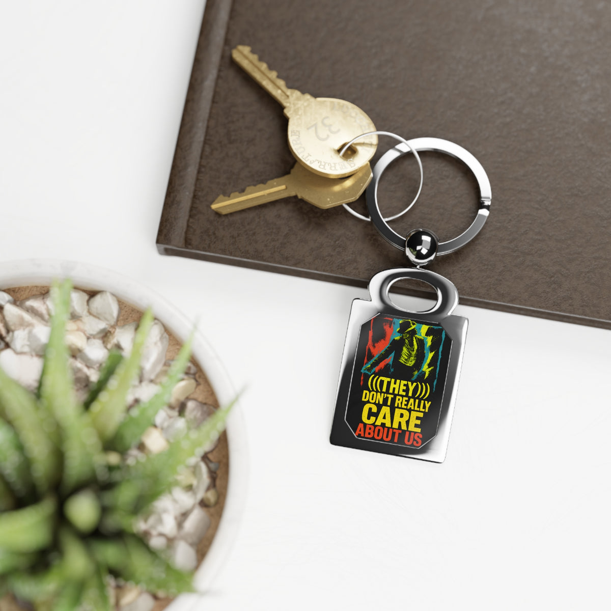 “They Don’t Really Care About Us” - Photo Keyring